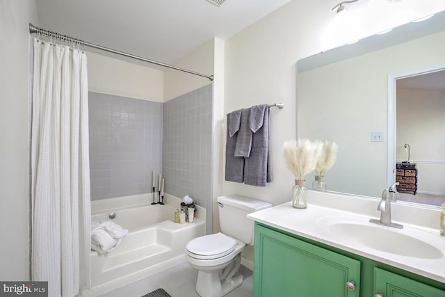 full bathroom with shower / tub combo with curtain, vanity, and toilet