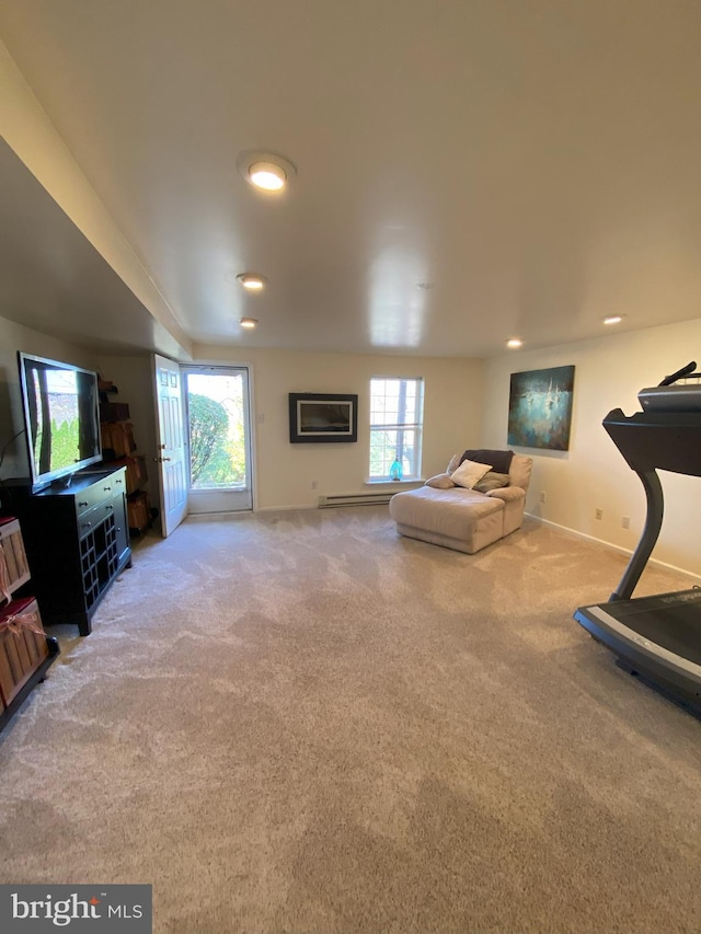 workout area with recessed lighting, carpet flooring, and baseboards