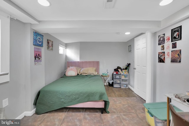 bedroom featuring wood-type flooring