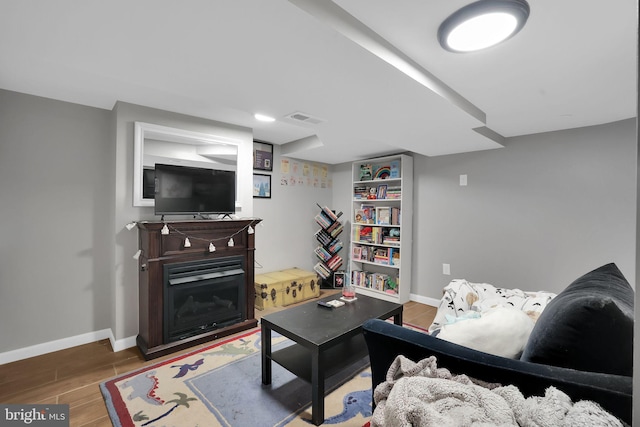 living room with hardwood / wood-style floors