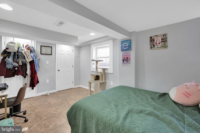 bedroom featuring tile patterned floors