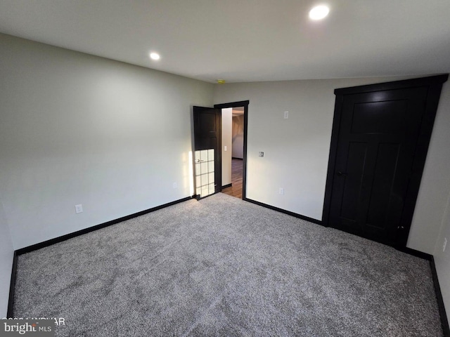 unfurnished bedroom featuring carpet