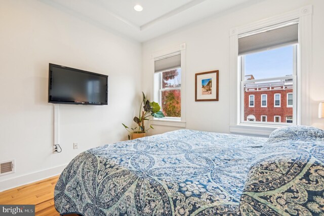 bedroom with wood-type flooring