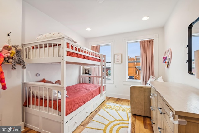 bedroom with light hardwood / wood-style floors