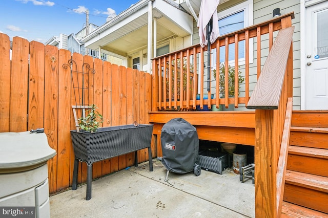 view of patio featuring a grill