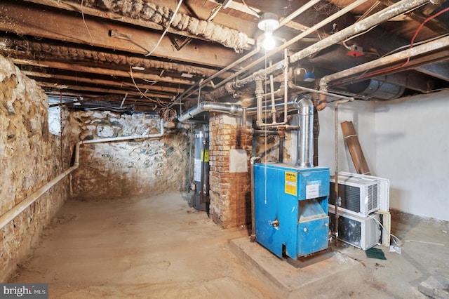 basement featuring water heater