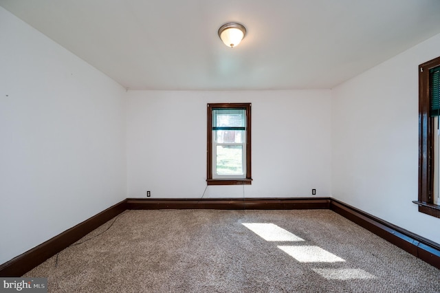 spare room with carpet floors