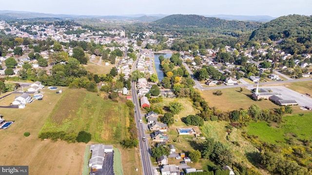 drone / aerial view featuring a mountain view