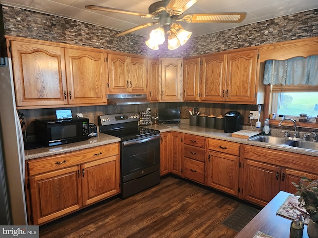 kitchen with dark hardwood / wood-style flooring, sink, ceiling fan, and black appliances