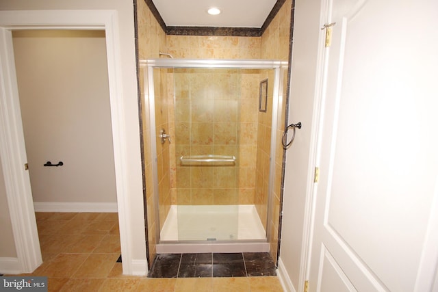 bathroom featuring an enclosed shower