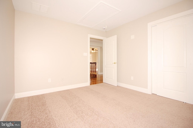 spare room featuring carpet floors