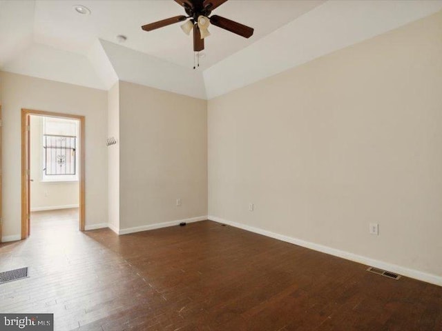 unfurnished room featuring ceiling fan and dark hardwood / wood-style flooring