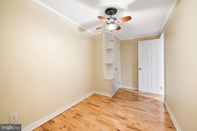 unfurnished bedroom with light wood-type flooring, ceiling fan, and crown molding