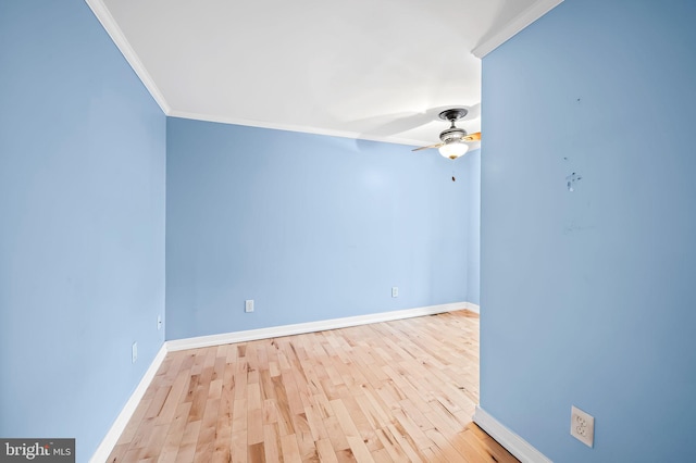 empty room with light wood-type flooring, ceiling fan, and ornamental molding