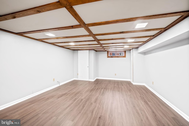 basement with wood-type flooring