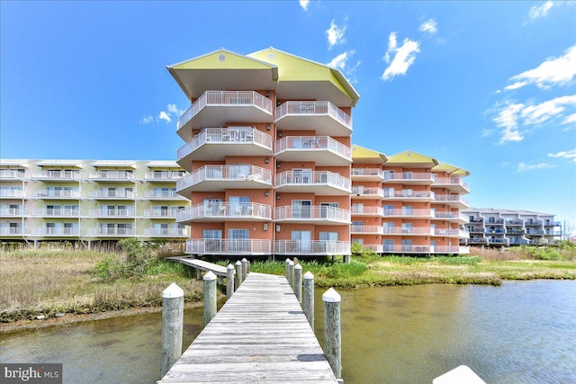 view of building exterior with a water view