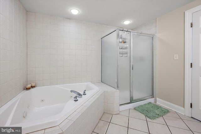 bathroom featuring shower with separate bathtub and tile patterned floors