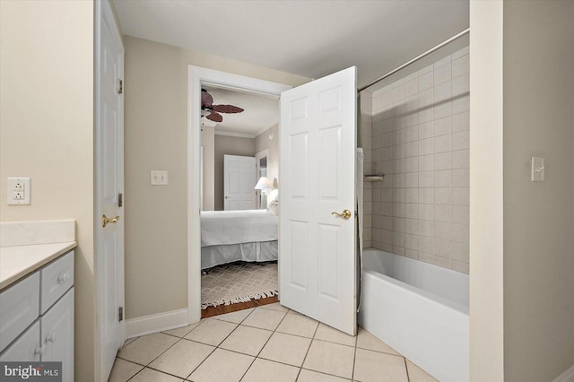 bathroom with ceiling fan, tile patterned flooring, vanity, and crown molding