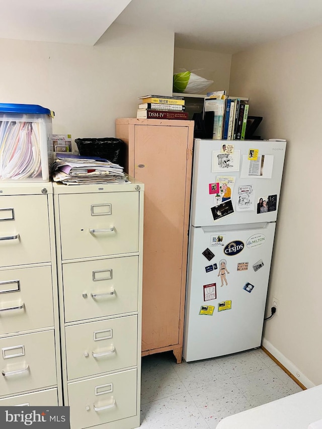 interior space with white fridge