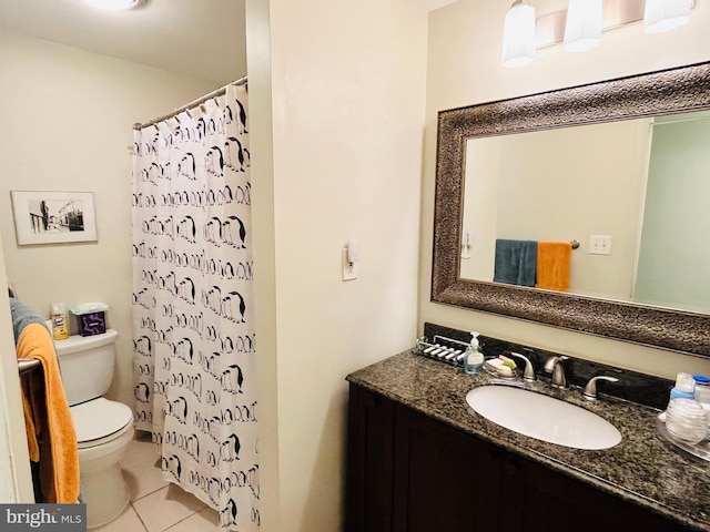 bathroom featuring a shower with shower curtain, tile patterned floors, vanity, and toilet