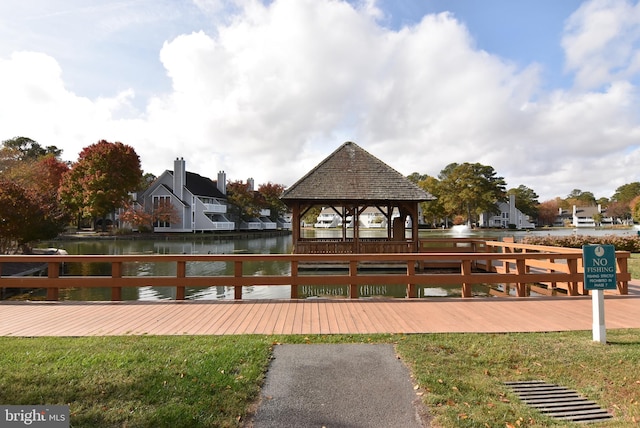 dock area featuring a gazebo and a water view