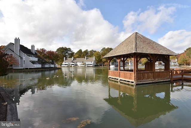 dock area featuring a gazebo and a water view