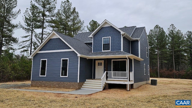 craftsman house featuring a porch and central AC