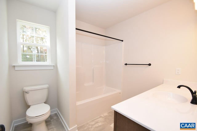 full bathroom featuring vanity, shower / bath combination, and toilet