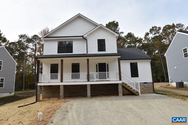 view of front of property with a porch and central air condition unit