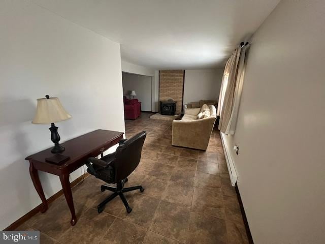 office area featuring a wood stove