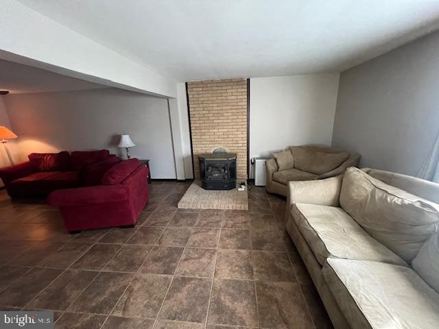 living room featuring a wood stove