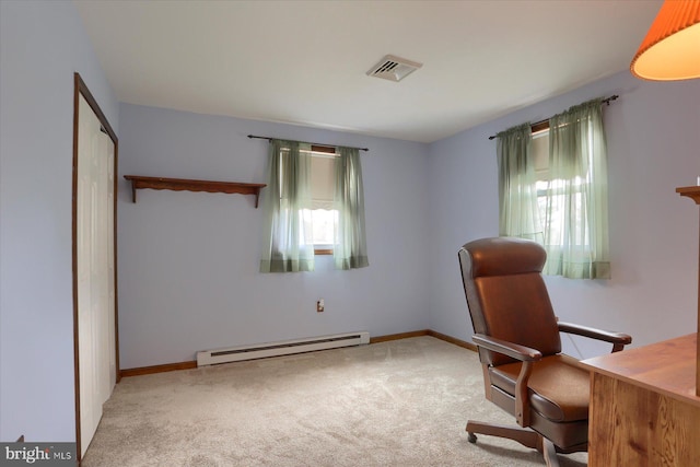 carpeted office space featuring a baseboard radiator