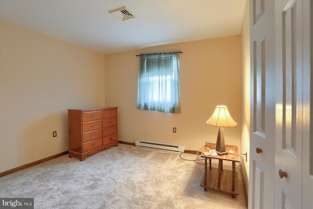 sitting room with light carpet and a baseboard radiator