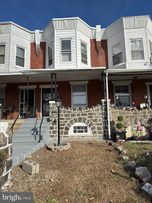 multi unit property featuring covered porch