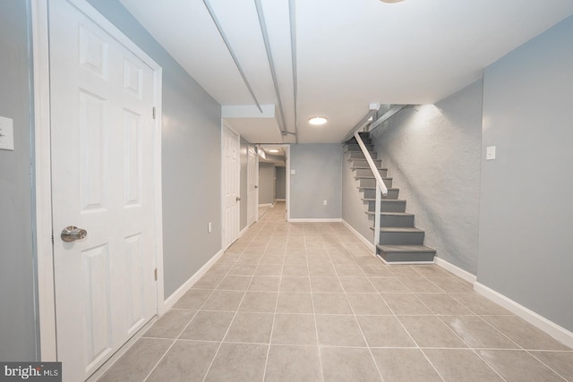 basement with light tile patterned floors