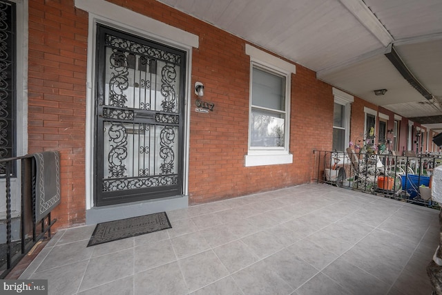 entrance to property with covered porch