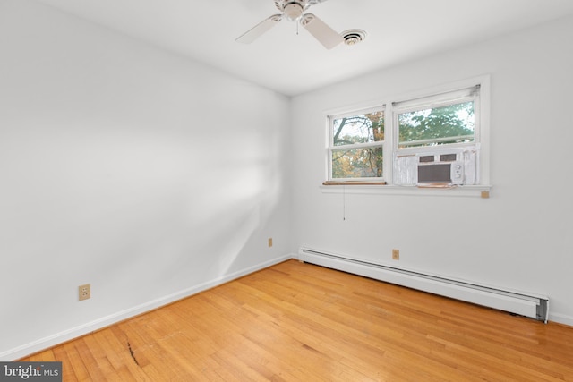 unfurnished room featuring light wood-type flooring, cooling unit, baseboard heating, and ceiling fan