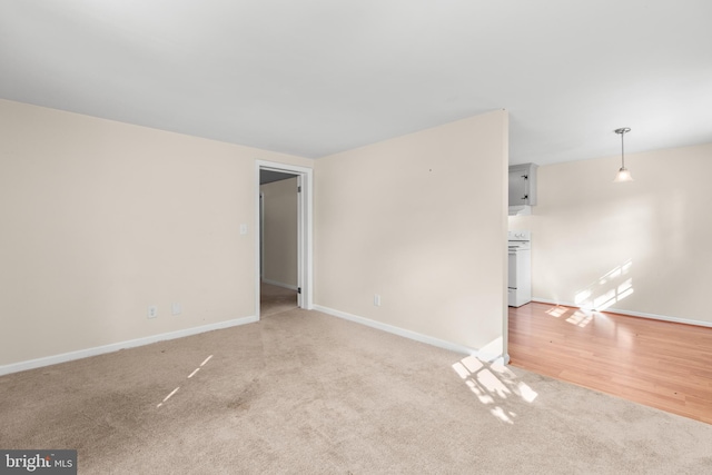 unfurnished room featuring light hardwood / wood-style flooring