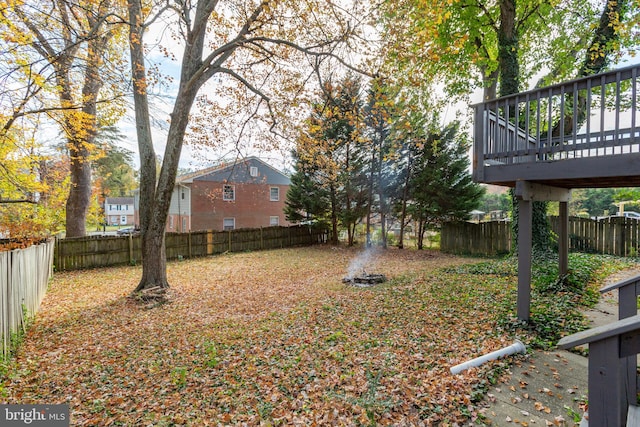 view of yard with a deck