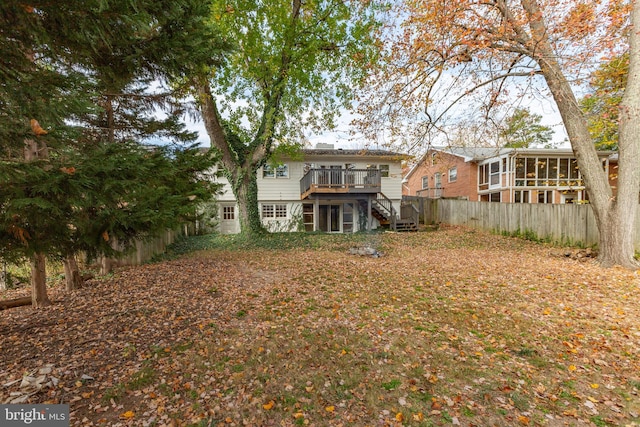 view of yard with a wooden deck