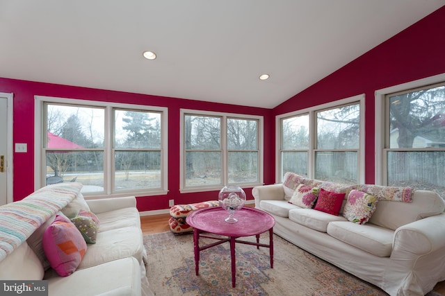 living room with vaulted ceiling, wood finished floors, and recessed lighting