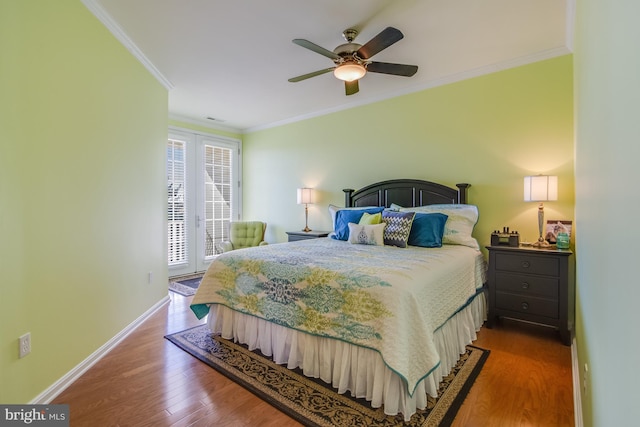 bedroom with ceiling fan, ornamental molding, and hardwood / wood-style flooring