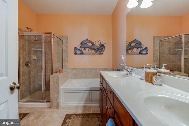 bathroom featuring vanity, plus walk in shower, and tile patterned floors