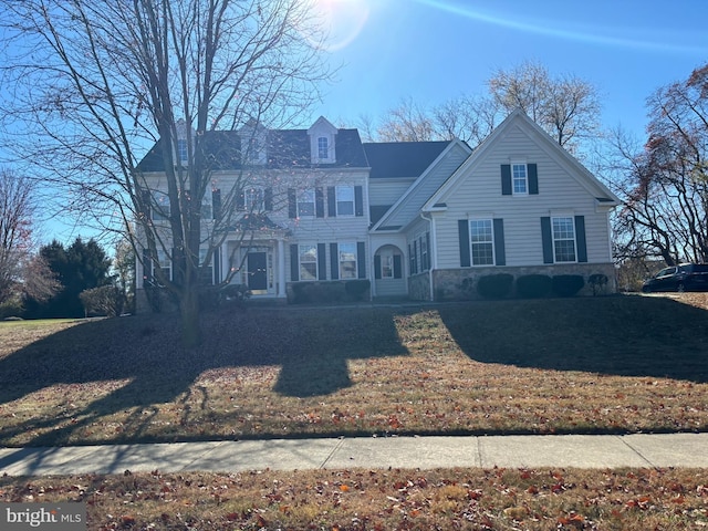 view of front of house with a front lawn