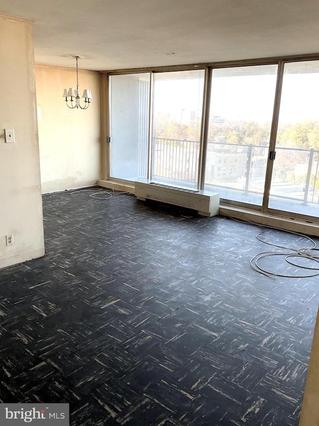 3900 Ford Rd Unit 11R, Philadelphia, PA 19131 - unfurnished room featuring a chandelier and plenty of natural light