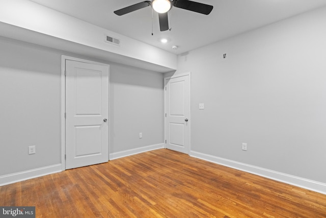 interior space with hardwood / wood-style flooring and ceiling fan