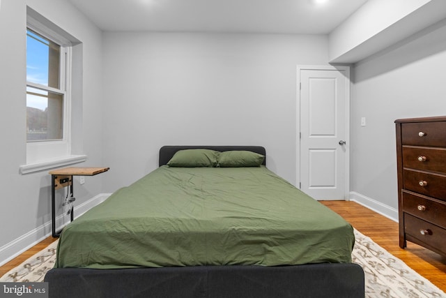 bedroom featuring light hardwood / wood-style flooring