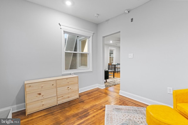 sitting room with hardwood / wood-style floors