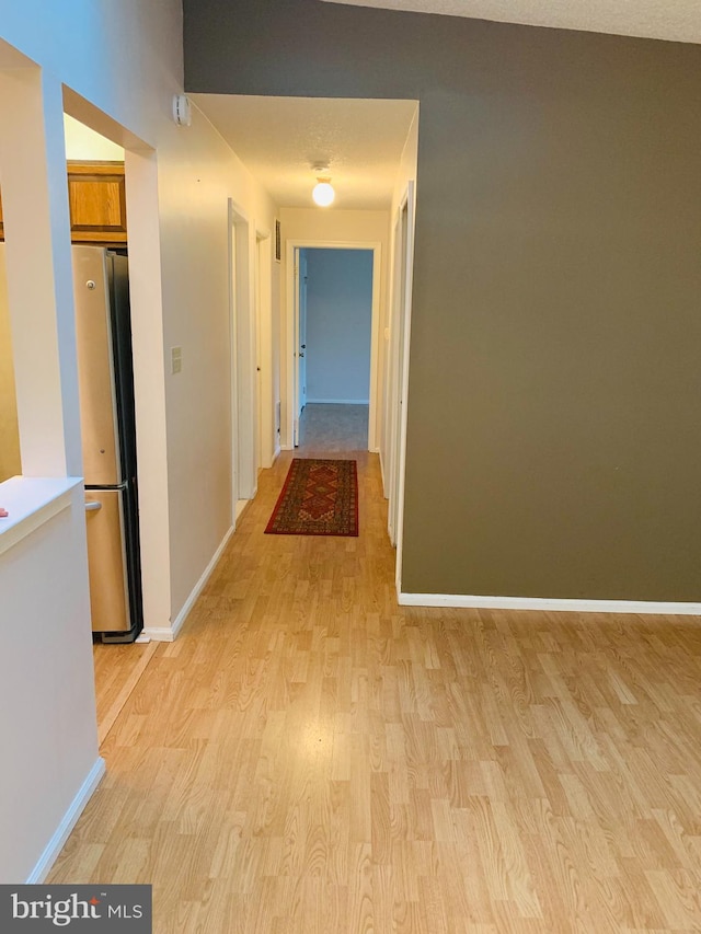 hall featuring light hardwood / wood-style flooring