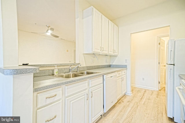 kitchen with white cabinetry, sink, light hardwood / wood-style floors, white appliances, and ceiling fan